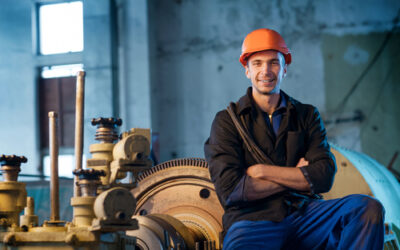 Smiling worker in a factory
