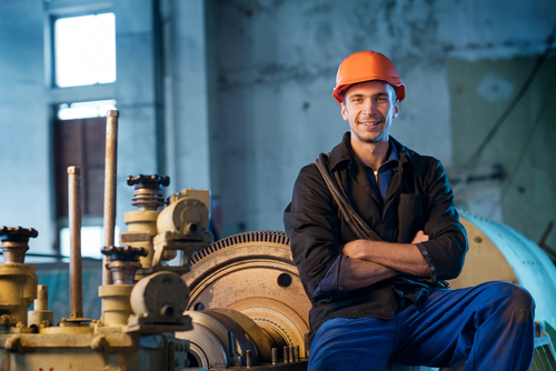 Smiling worker in a factory